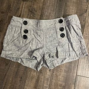 Black and white Express button front shorts
